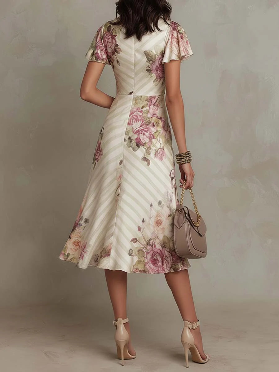 Midi dress with floral pattern for wedding guests | Wrap style with V-neckline and light flutter sleeves | A-line cut