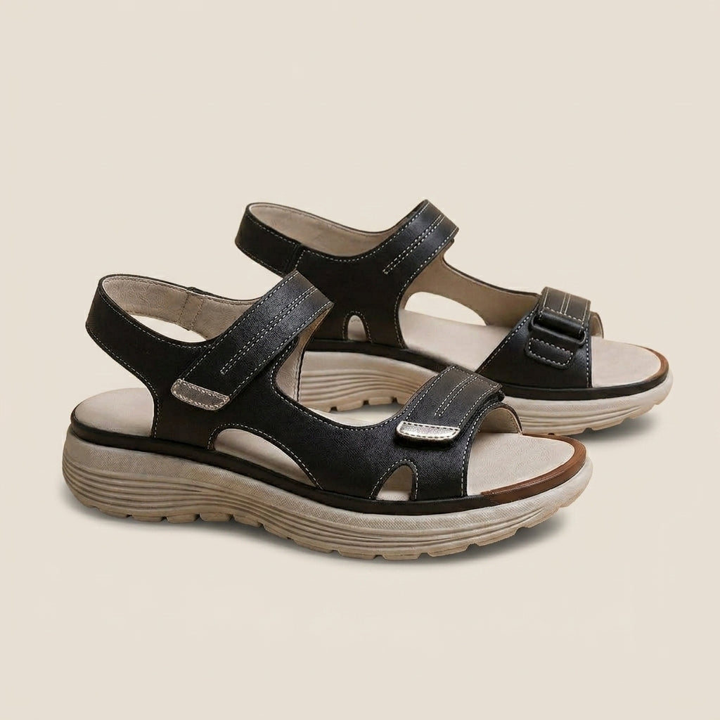 Orthopedic women's sandals with adjustable straps and anatomical footbed for relief from heel spurs