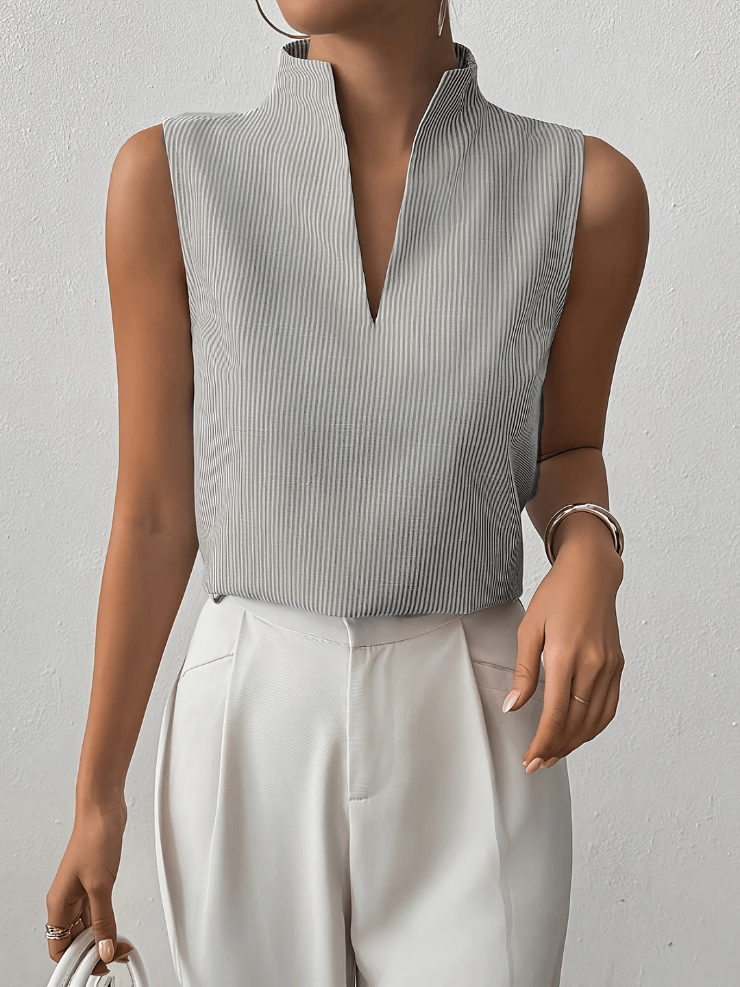 Sleeveless blouse for women with striped pattern | Elegant business top with stand-up collar and V-neck for the office
