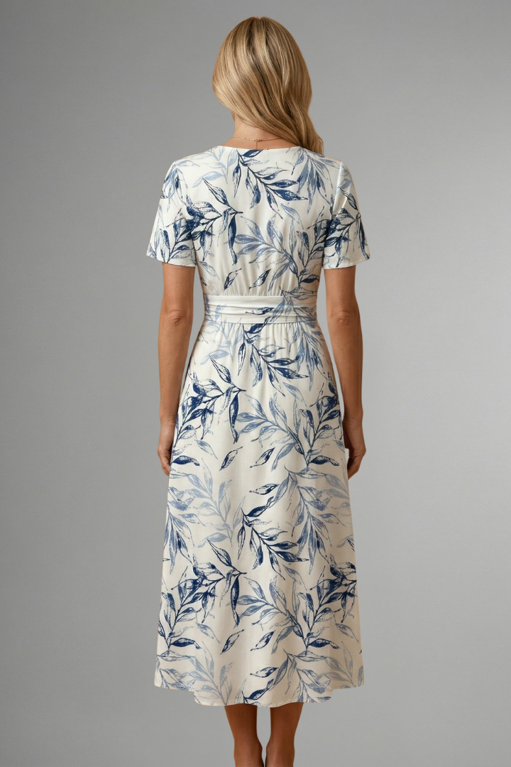 Damen Midikleid mit Blumenmuster und V-Ausschnitt | Tailliertes A-Linien Kleid mit kurzen Ärmeln in moderner Midi-Länge