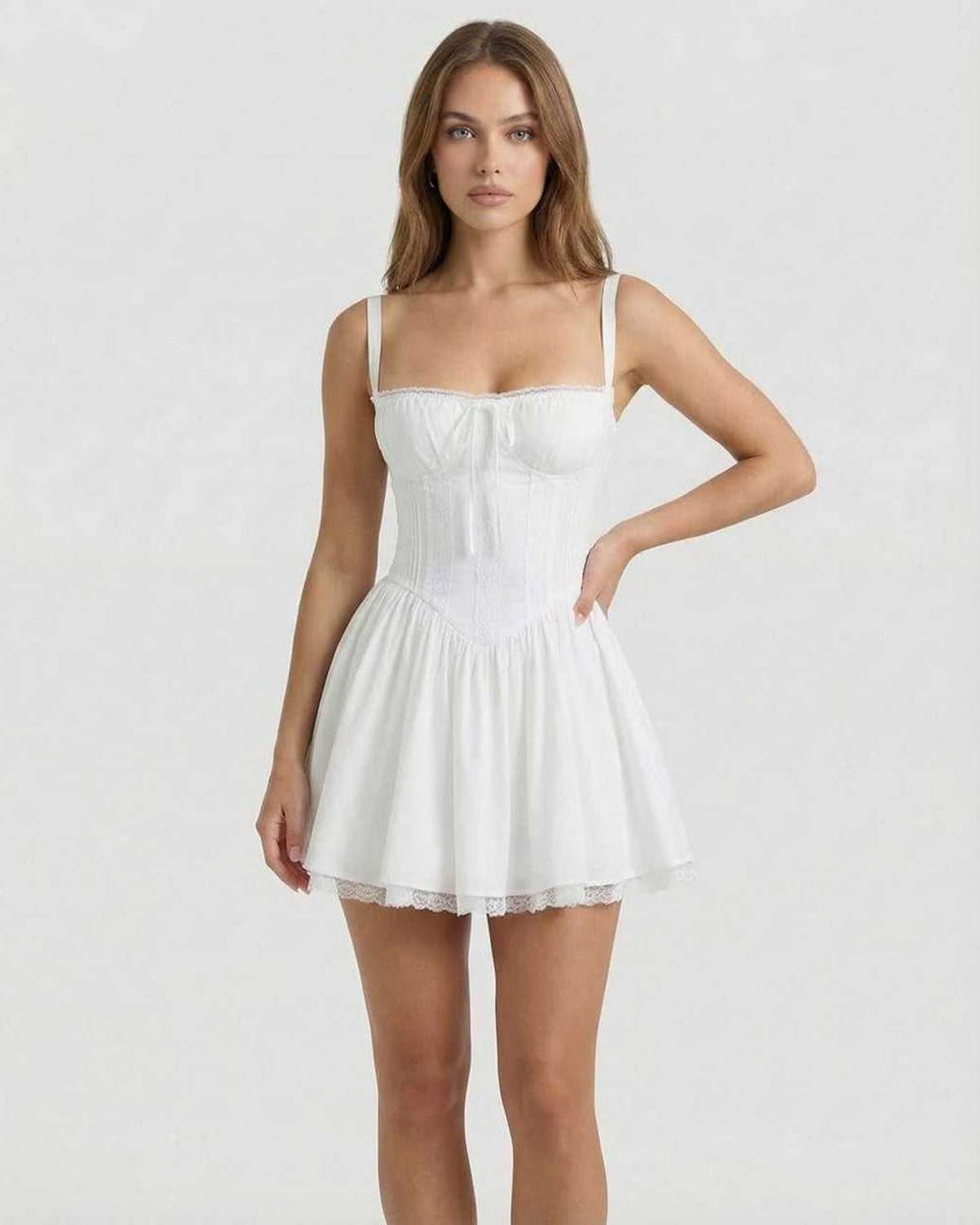 Elara Mini Dress - White corset style mini dress with lace trim by Lauven, offering feminine charm and a structured silhouette.