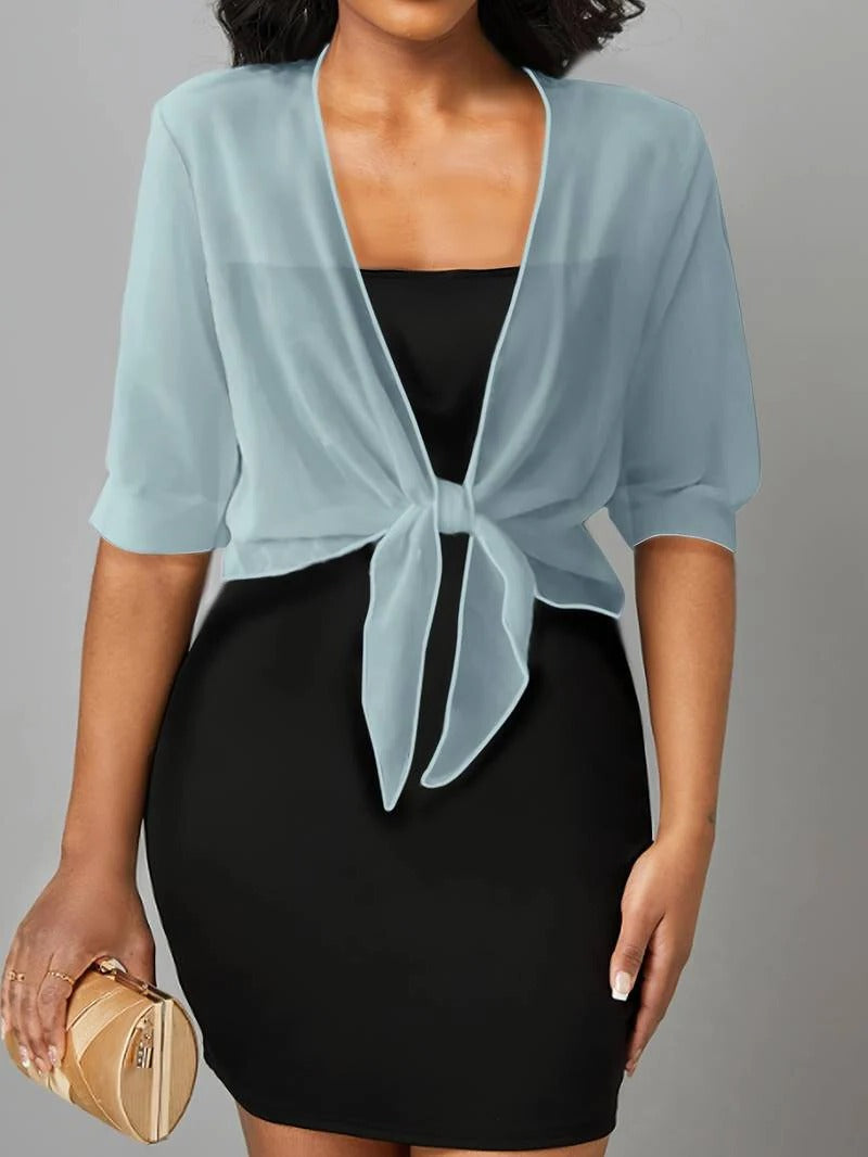 Transparent women's blouse with tie knot and 3/4 sleeves