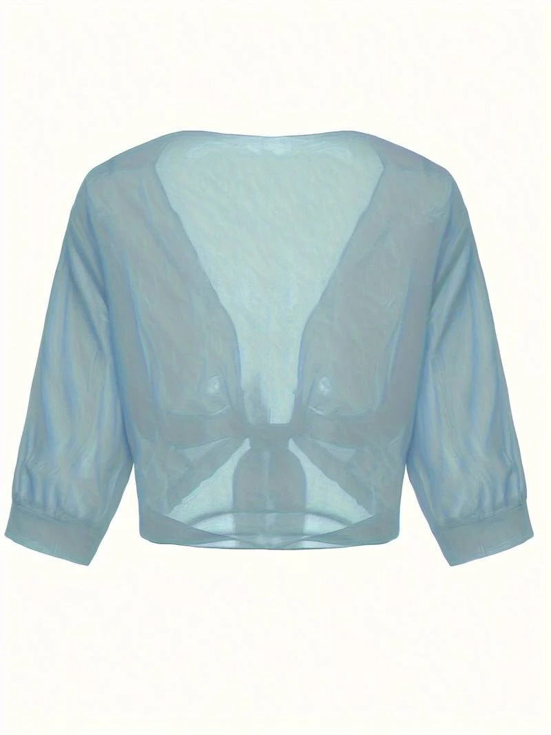Transparent women's blouse with tie knot and 3/4 sleeves