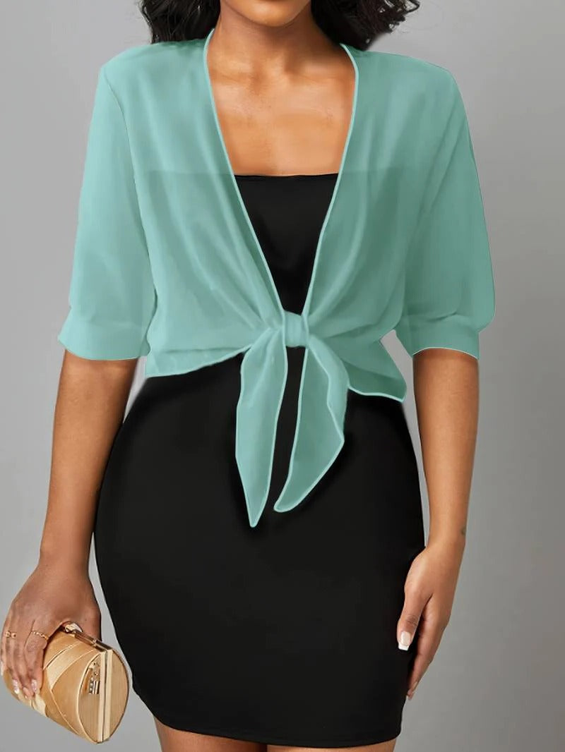 Transparent women's blouse with tie knot and 3/4 sleeves