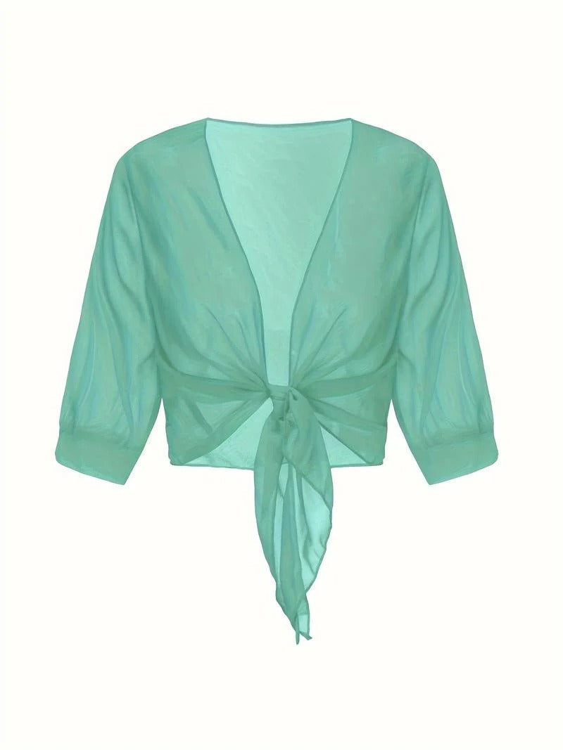 Transparent women's blouse with tie knot and 3/4 sleeves