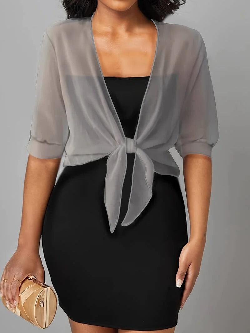 Transparent women's blouse with tie knot and 3/4 sleeves