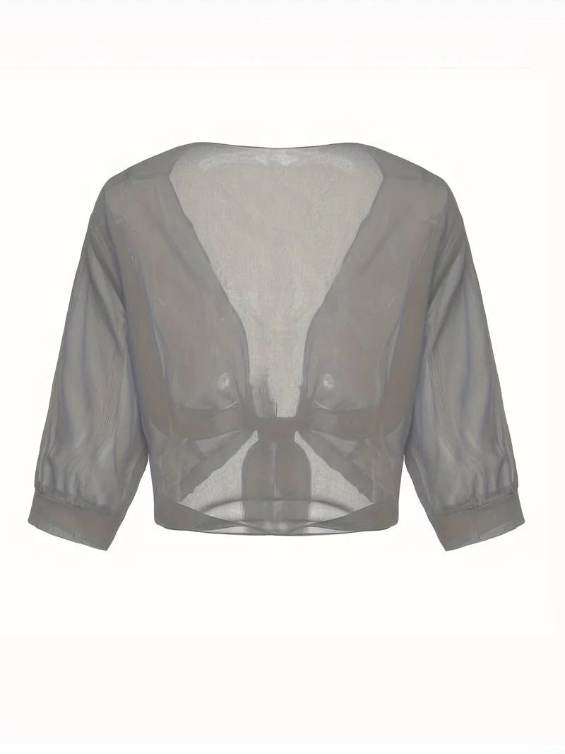 Transparent women's blouse with tie knot and 3/4 sleeves