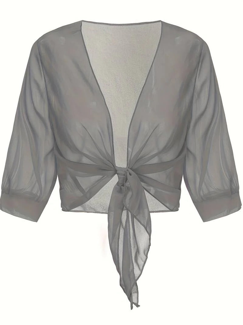 Transparent women's blouse with tie knot and 3/4 sleeves