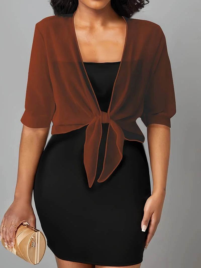 Transparent women's blouse with tie knot and 3/4 sleeves