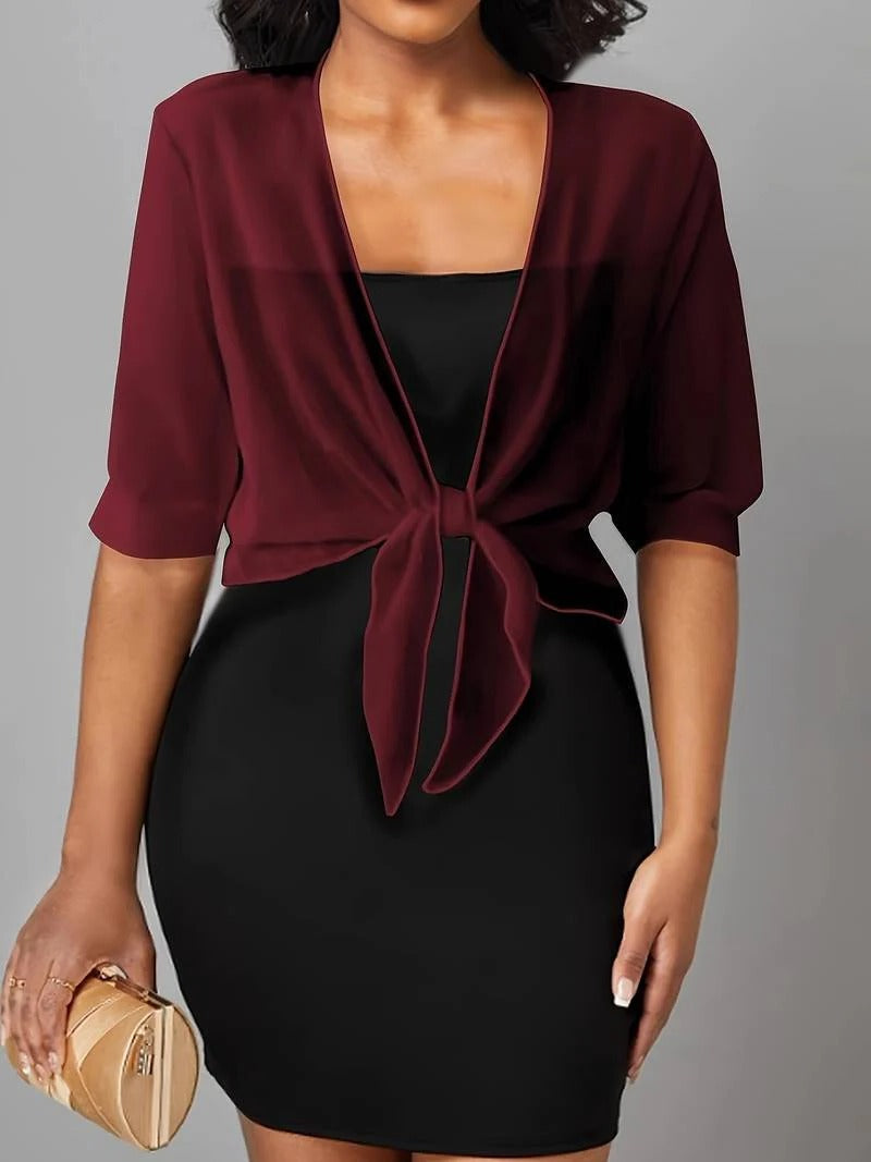 Transparent women's blouse with tie knot and 3/4 sleeves