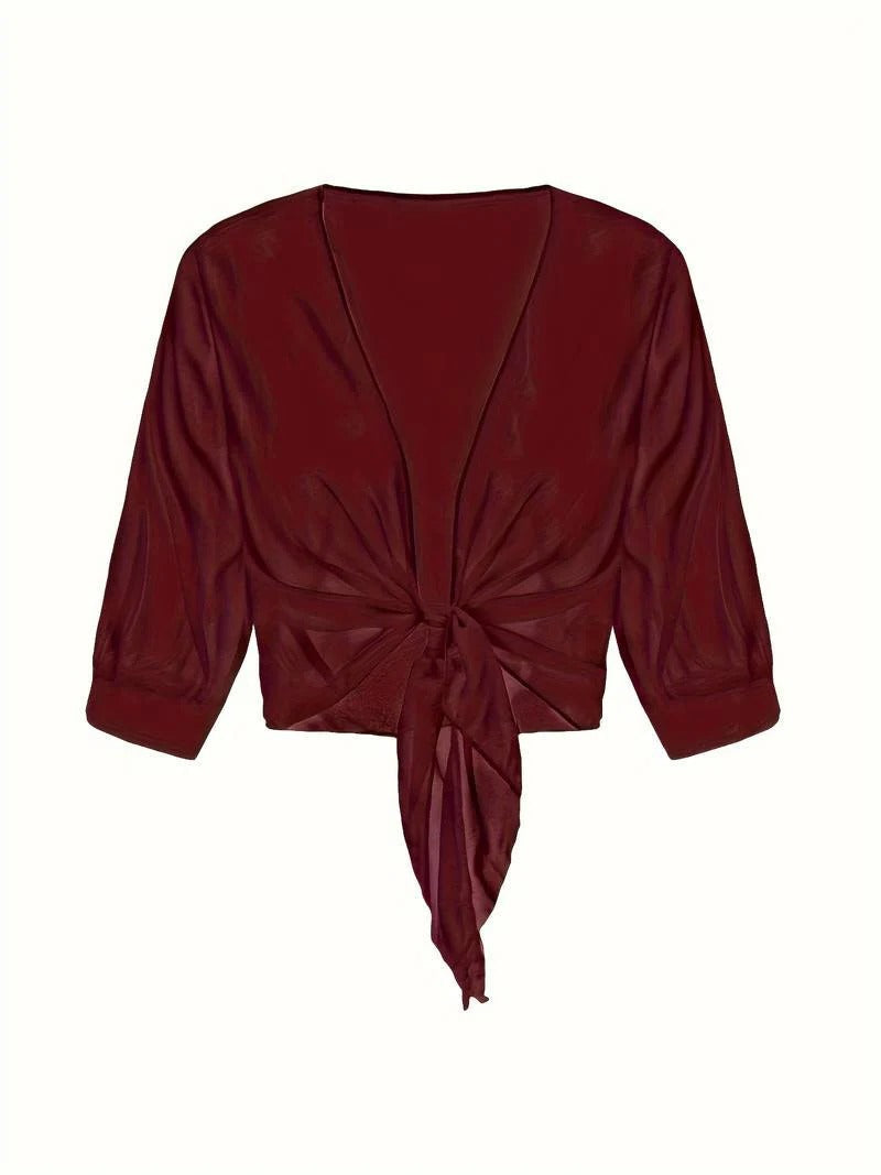 Transparent women's blouse with tie knot and 3/4 sleeves
