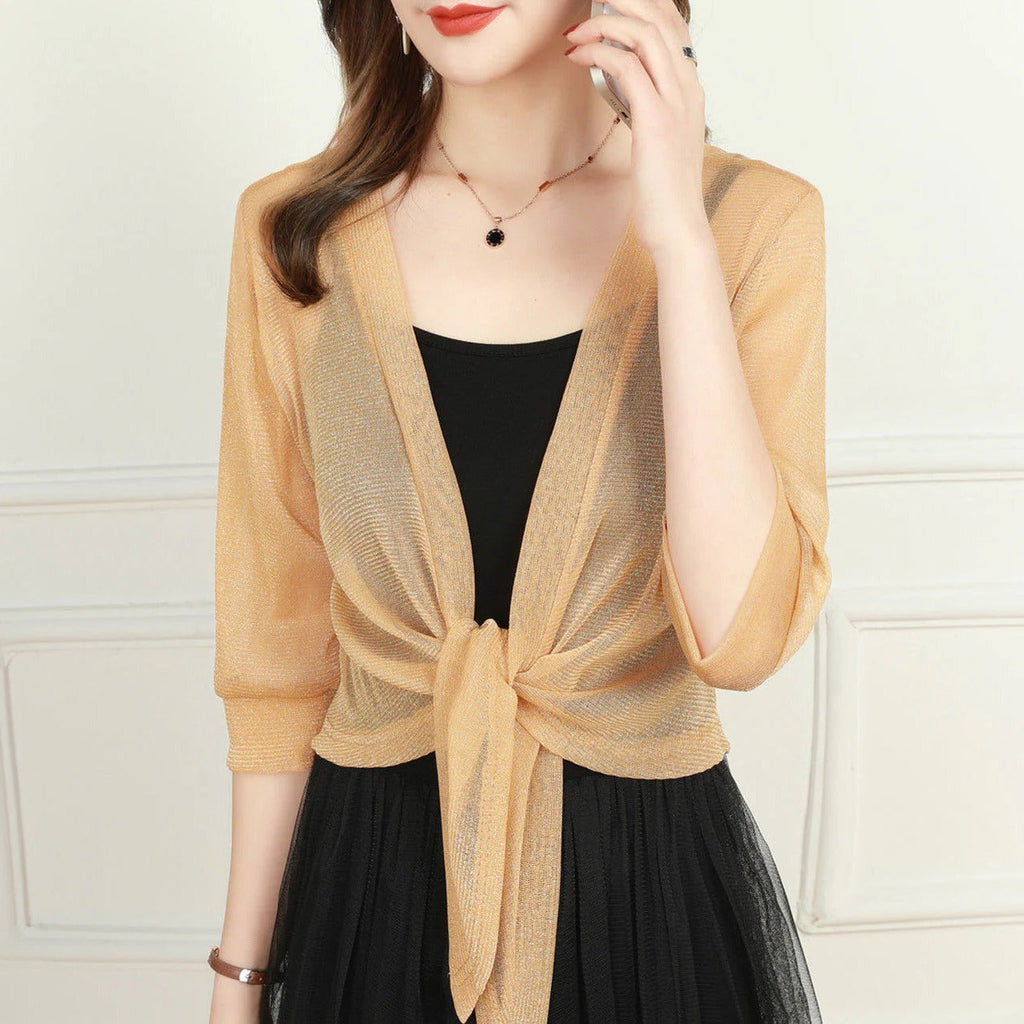 Transparent women's blouse with tie knot and 3/4 sleeves