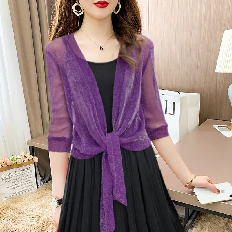 Transparent women's blouse with tie knot and 3/4 sleeves