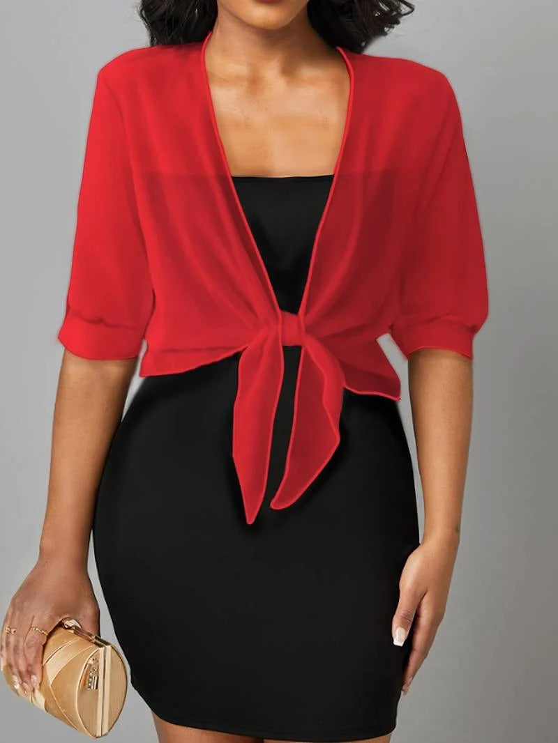 Transparent women's blouse with tie knot and 3/4 sleeves