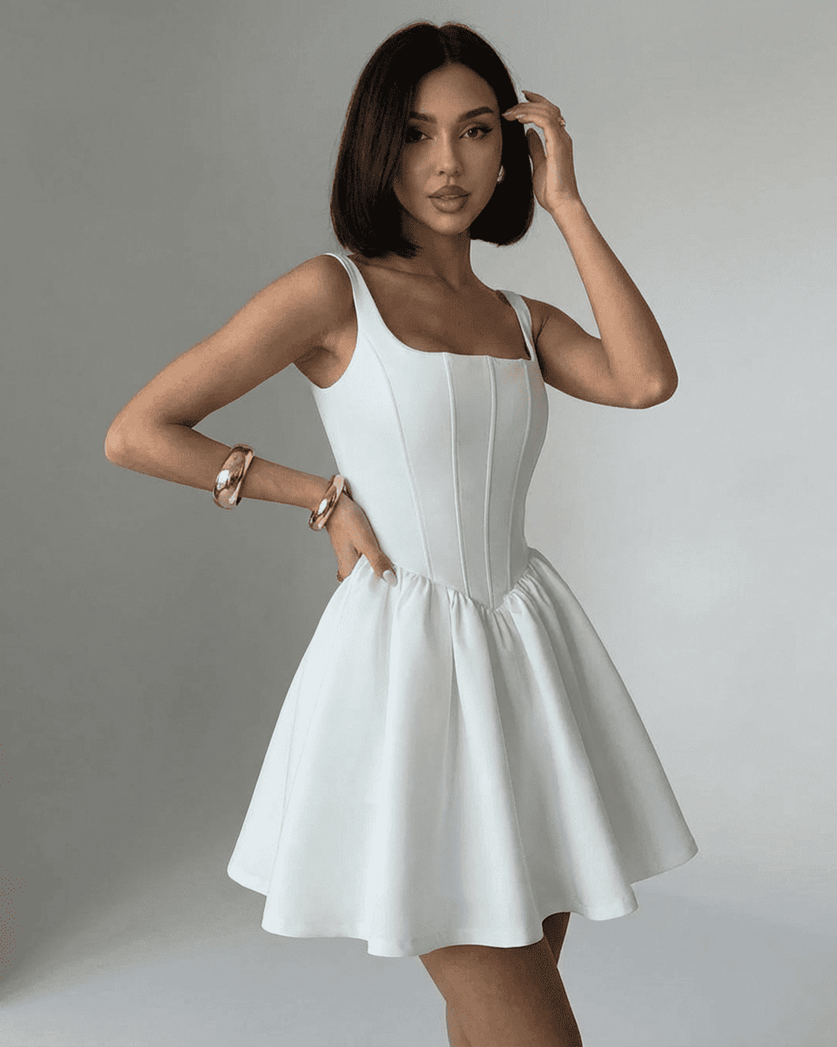 Alba Mini Dress by Lauven, a pure white structured corset mini with a square neckline and sculpted silhouette.