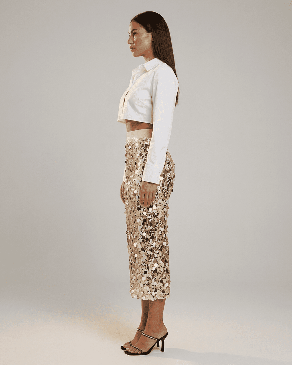 Aureline Midi Skirt by Lauven: Sequin high waist bodycon midi skirt showcased on model in profile view.