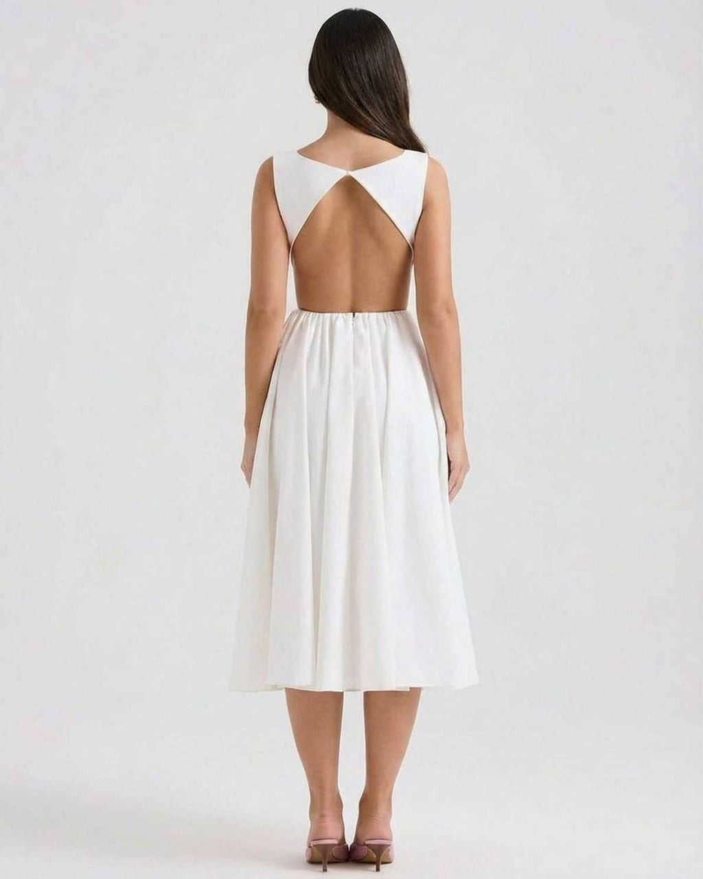 Elysia Midi Dress by Lauven, showcasing elegant A-line design with open back detail in white.