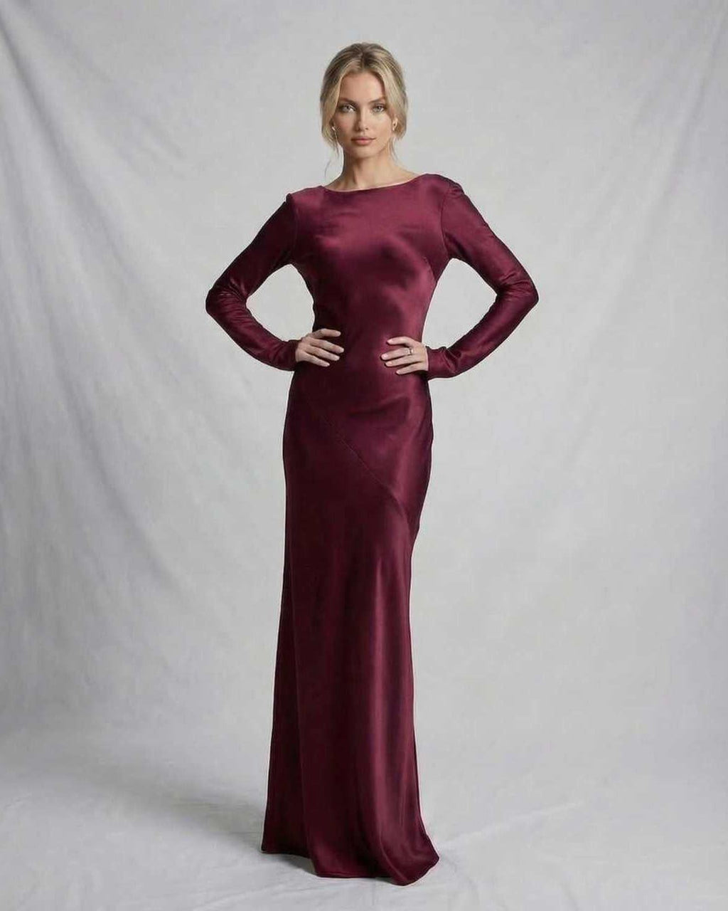 Vesper Maxi Dress from Lauven in rich burgundy satin with a sleek silhouette and long sleeves.